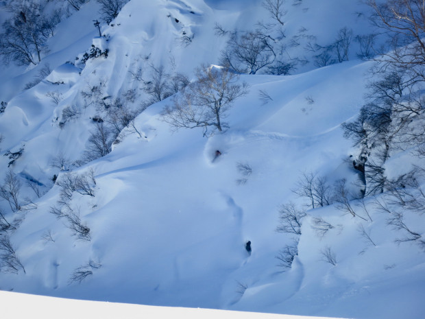 Unknown Japanese snowboarder on the dark side.