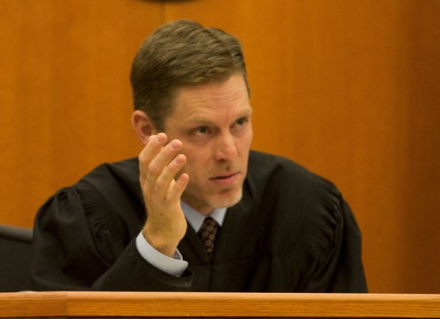 Ryan M. Harris, listens to arguments in the Park City Mountain Resort vs. Vail hearing in Third District Court in Park City, Thursday, June 19, 2014.  photo:  Fox 13