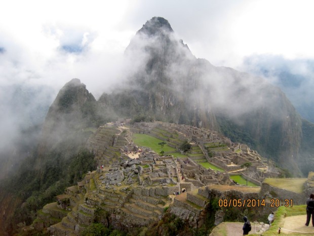 fog rising from above the ancient city with and its surrounding peaks. Photo credit Michael Mulcahy.