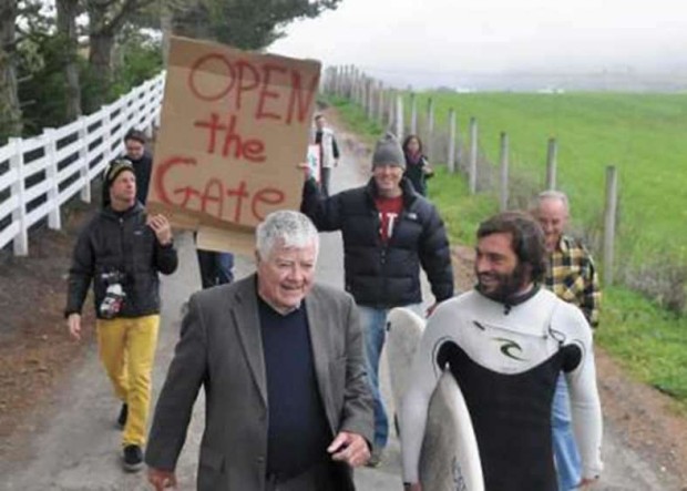 Former U.S. Representative Pete McCloskey talks with and support local surfers in opening the beach back up to the public.