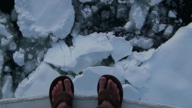 Ice Breaking in Sunset in Gerlache Straight, Antarctica in Fip-Flops. photo: snowbrains