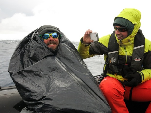 Guide Doug Workman focusing on staying dry on the Zodiac ride.