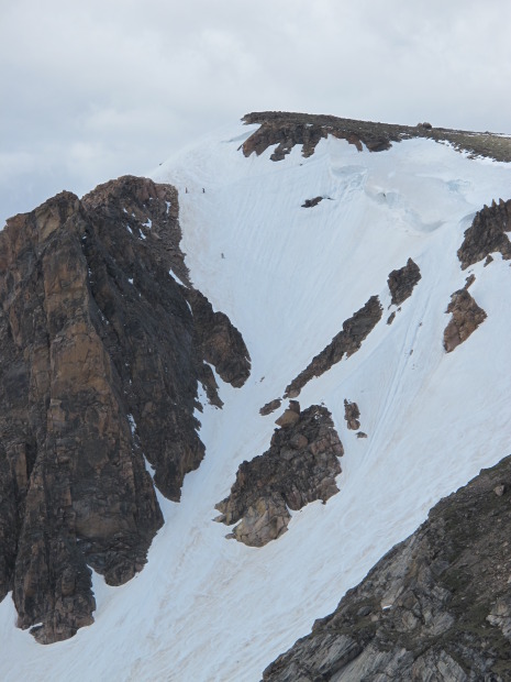 Big face, little people (find the dots on the upper left)