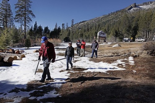 Frank Gehrke leads a team on Dec. 30 to conduct the snow survey in Echo Meadows. 