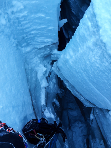 Pic taken by the rescuer as he was near the top of the hole. I can't believe I fell down that and was uninjured. You can see he's dragging my snowboard and backup up too