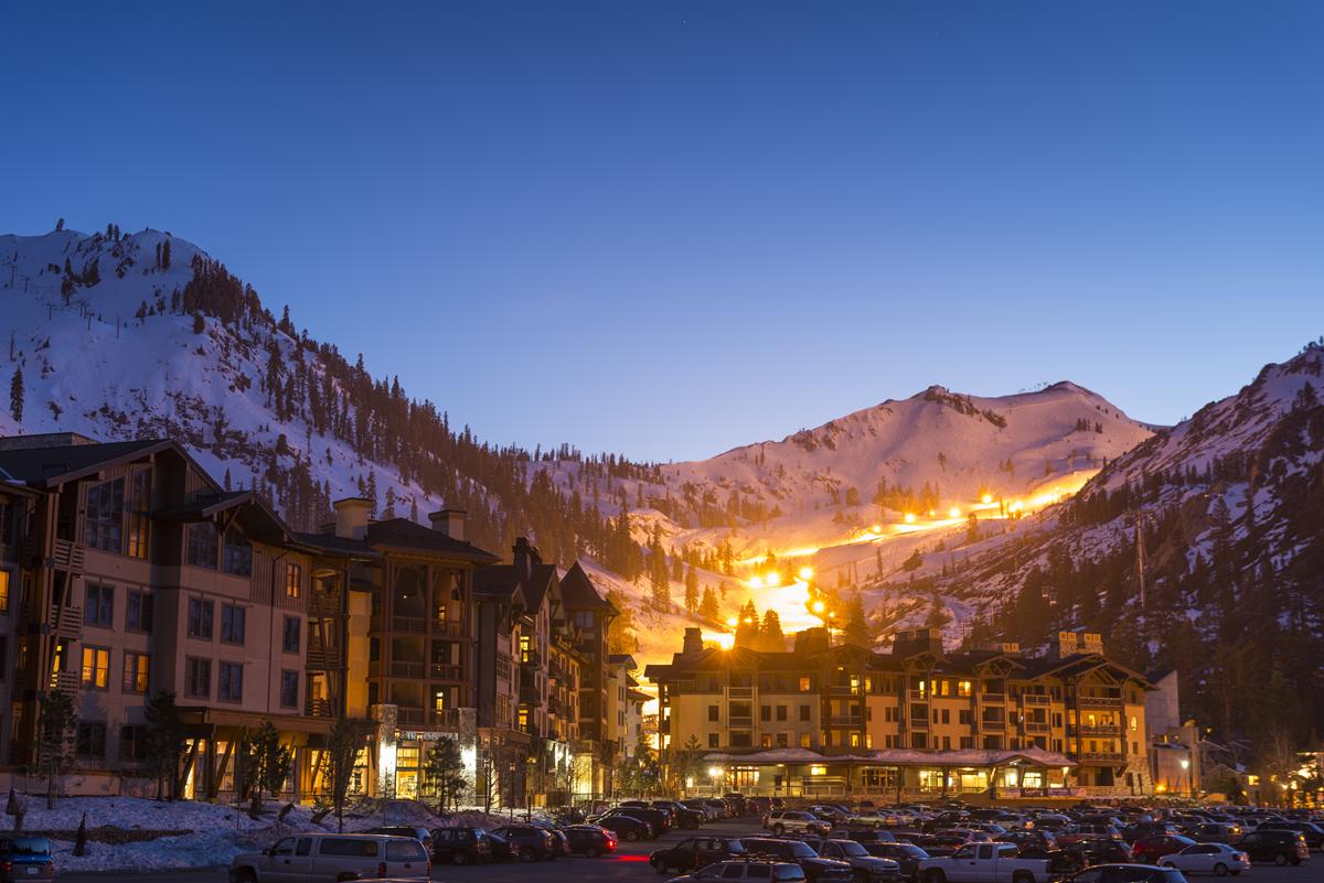 The Village at Squaw Valley, CA, during a night shot with the mountain run in the background