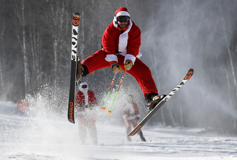 Santa busts a move on the slopes of Sunday River, December 4, 2016 Credit: AP Photo/Robert F. Bukaty