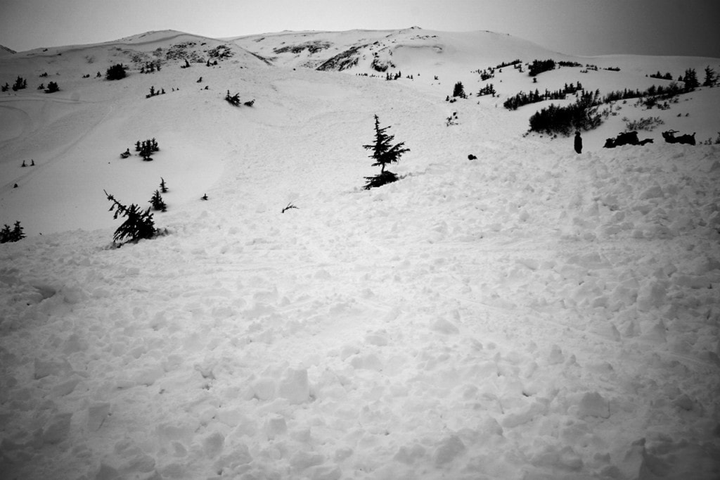 Looking up at the main crown face and slide path from just above toe of debris Credit: CNFAIC.org