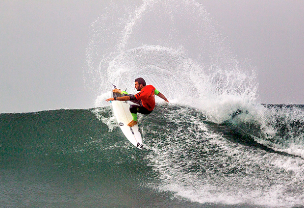 Joel Parkinson trying to push some of the fog away with this patented forehand hack.