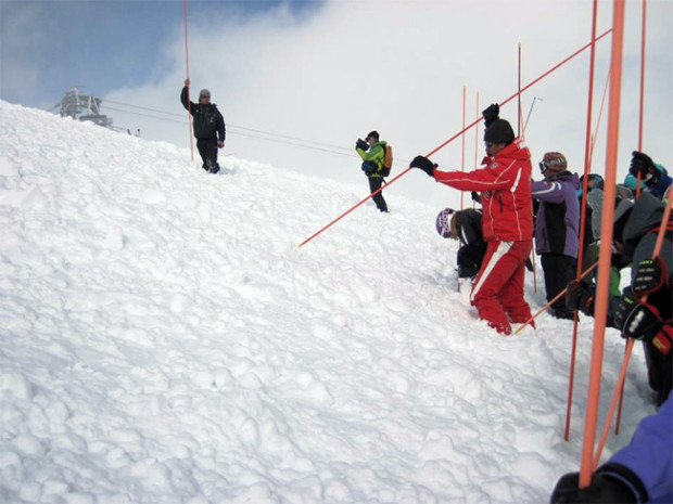 Probe line searching for skiers on Oct. 13th at Tignes.  photo:  Frederic Ribaud