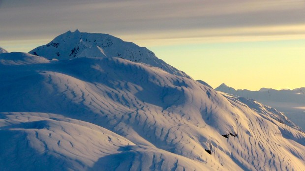 Moraine with wind lines and sunset.