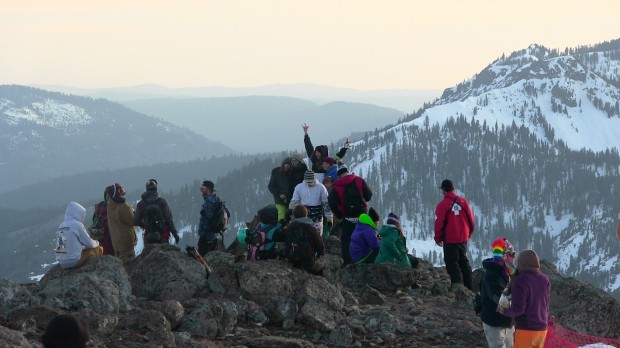 Happy people on top of Alpine