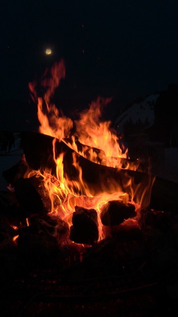 Bonfire melting the moon.