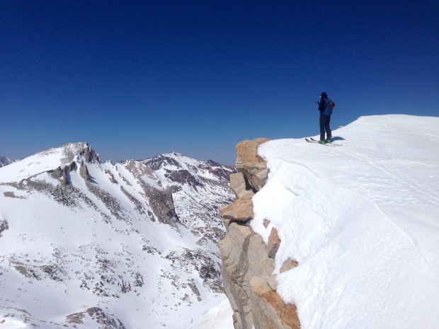 Here's Aaron Finley looking at North Peak from the top of one of the summit couloirs off Conness: