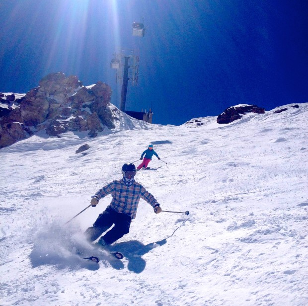 Brochure skiing under the gondy on Climax