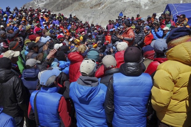 A Nepalese government delegation met with Sherpa mountain guides near Mount Everest's base camp on the south side of the mountain Thursday. The government was hoping to persuade the guides to continue working even though 16 Sherpas had died a week earlier. But fresh ice avalanches on Friday appear to have doomed Nepal's climbing season. Adrian Ballinger/Alpenglow Expeditions/AP