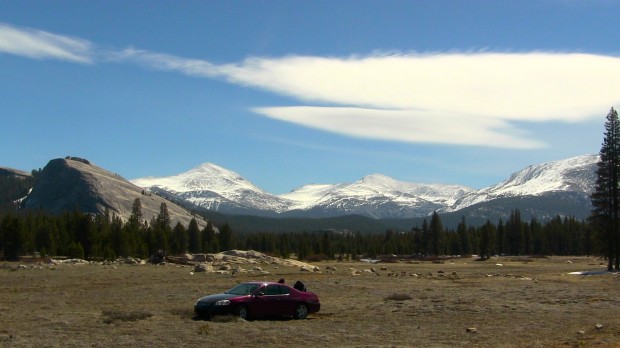 Car in the middle of Tuolumne Meadows, Yosemite National Park.  May 9th, 2014