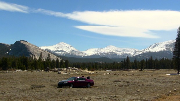 Car in the middle of Tuolumne Meadows, Yosemite National Park. May 9th, 2014