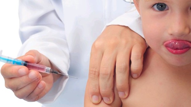 808106-vaccination-doctor-injecting-baby