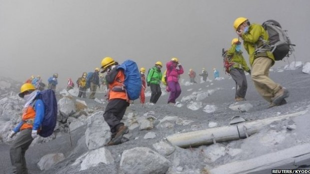 Survivors fleeing the ash. photo: reuters