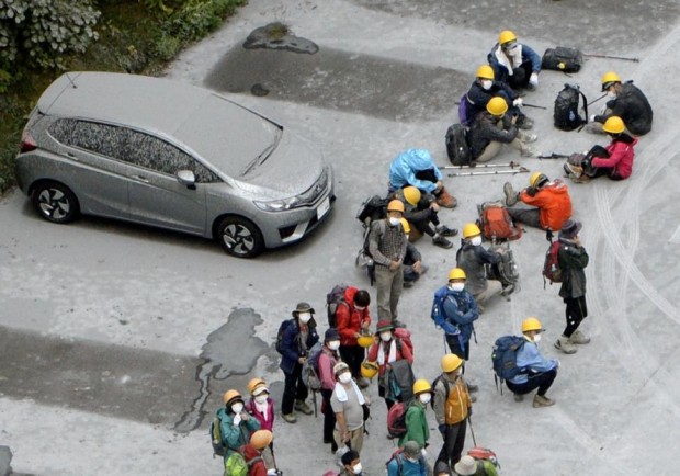 Survivors resting. photo: kyodo/reuters