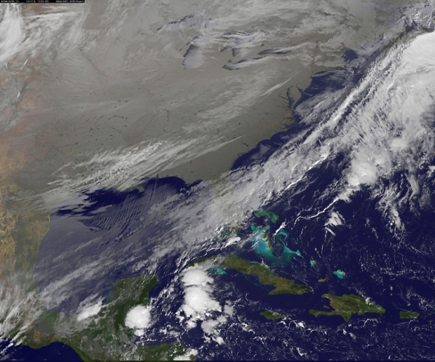 In this NOAA's GOES satellite infrared image taken on Nov. 18 at 7:30 a.m. EST.  This image shows the Great Lakes and the Lake-Effect snow they produced today. Image Credit: NASA/NOAA GOES Project, Dennis Chesters