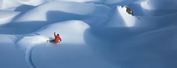 Gerry Lopez ripping on a snowboard.