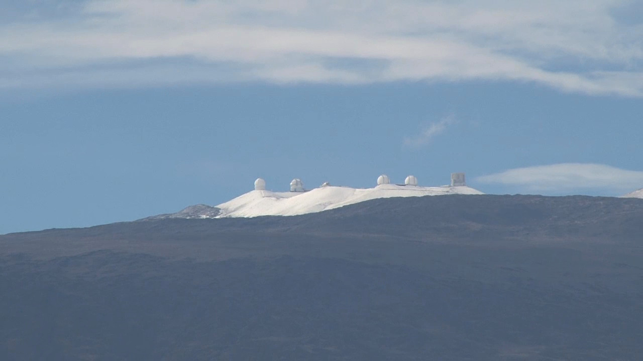 Snow on 13,800 Mauna Kea in Hawaii yesterday.