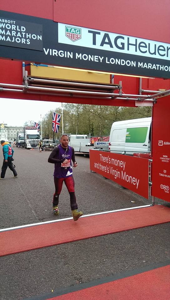 Alastair Machell running the Boston Marathon in ski boots. photo: al machell's facebook