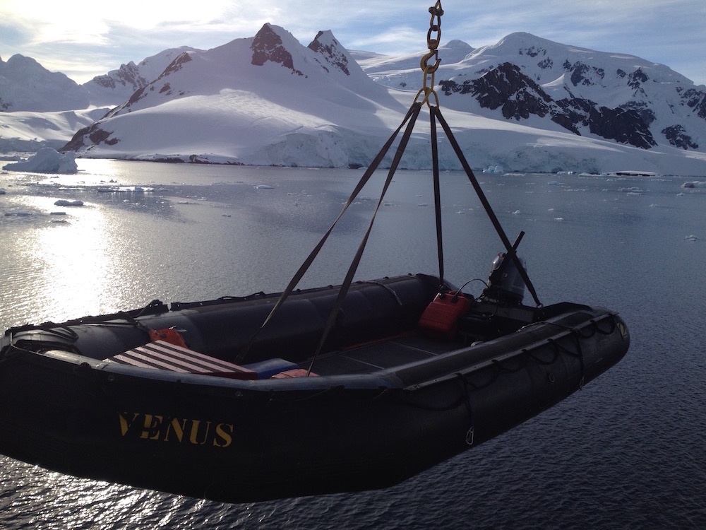 Lowering a Zodiac. image: miles clark