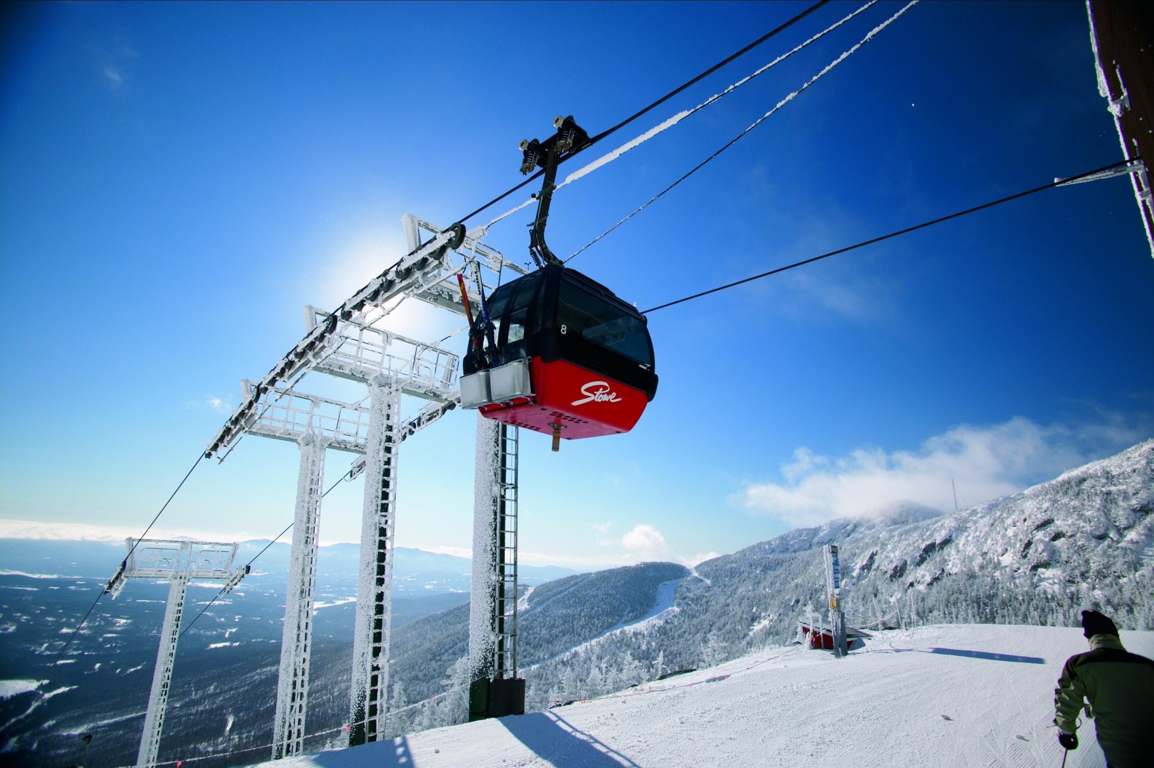 Stowe gondola in front of blue sky, one of Vail Resorts northeast resorts