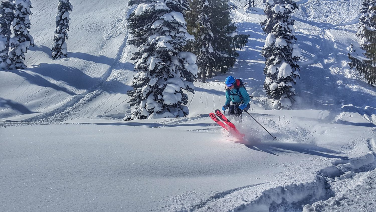 Shejumps, k2 skis, crystal Mountain, powder.
