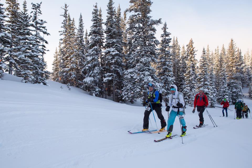 Photo depicts uphill skiers doing their thing