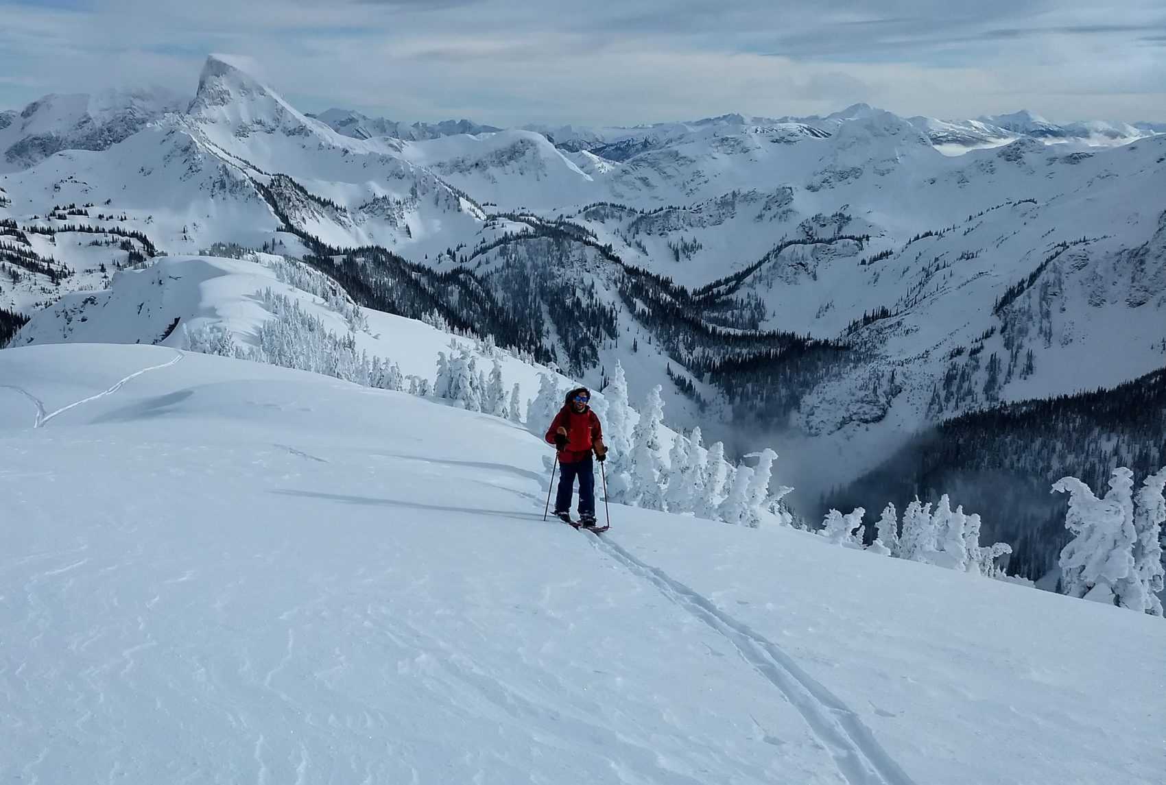 splitboarder ascending peak