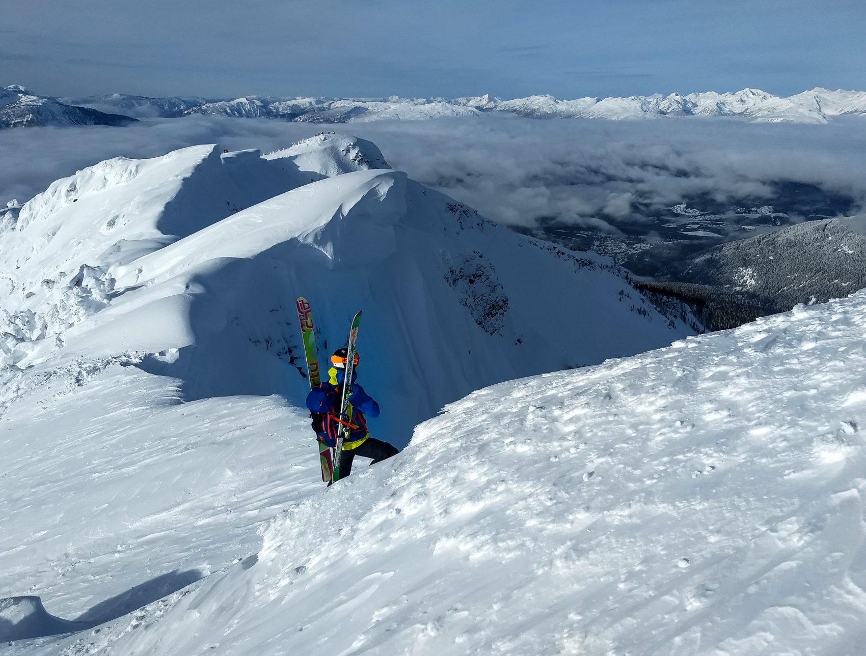 mountaineer looking at a cornice