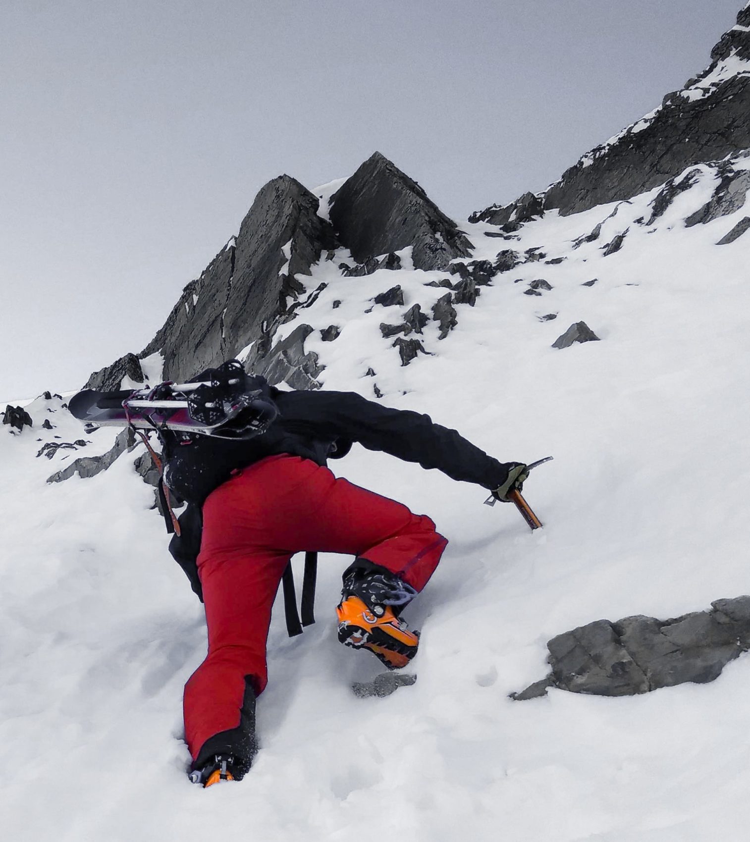 ski mountaineer climbing Ross Pass