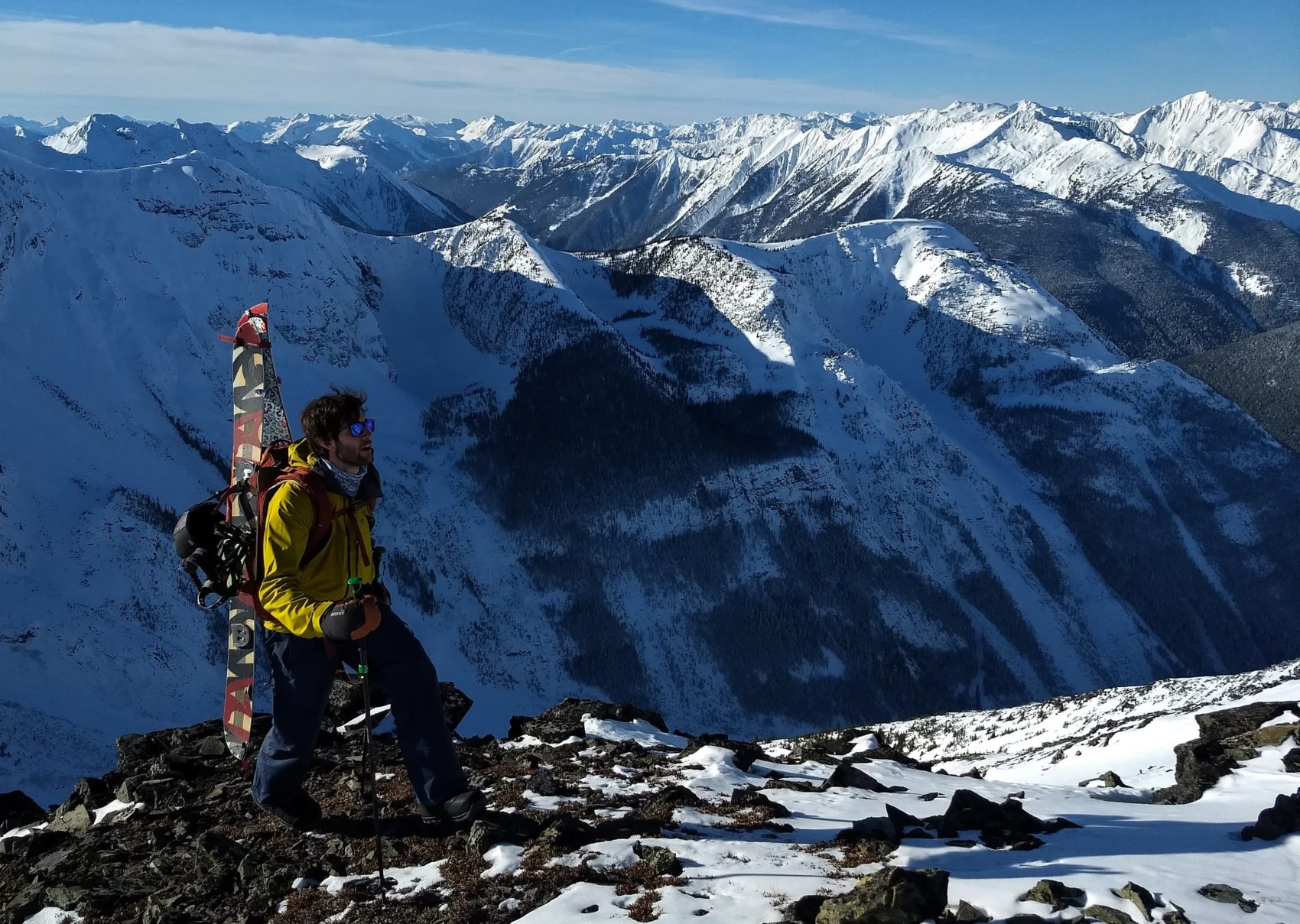 splitboarder hiking up ridge