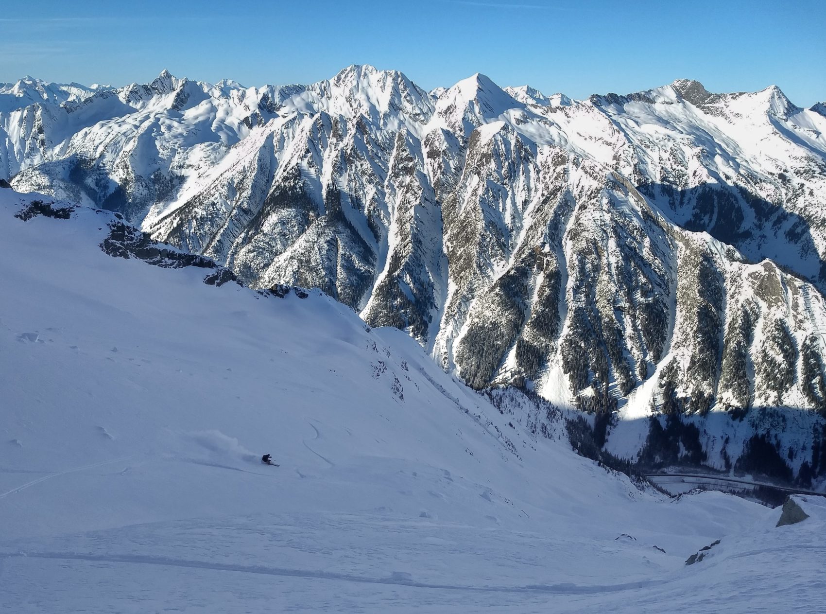 skier down ross peak path