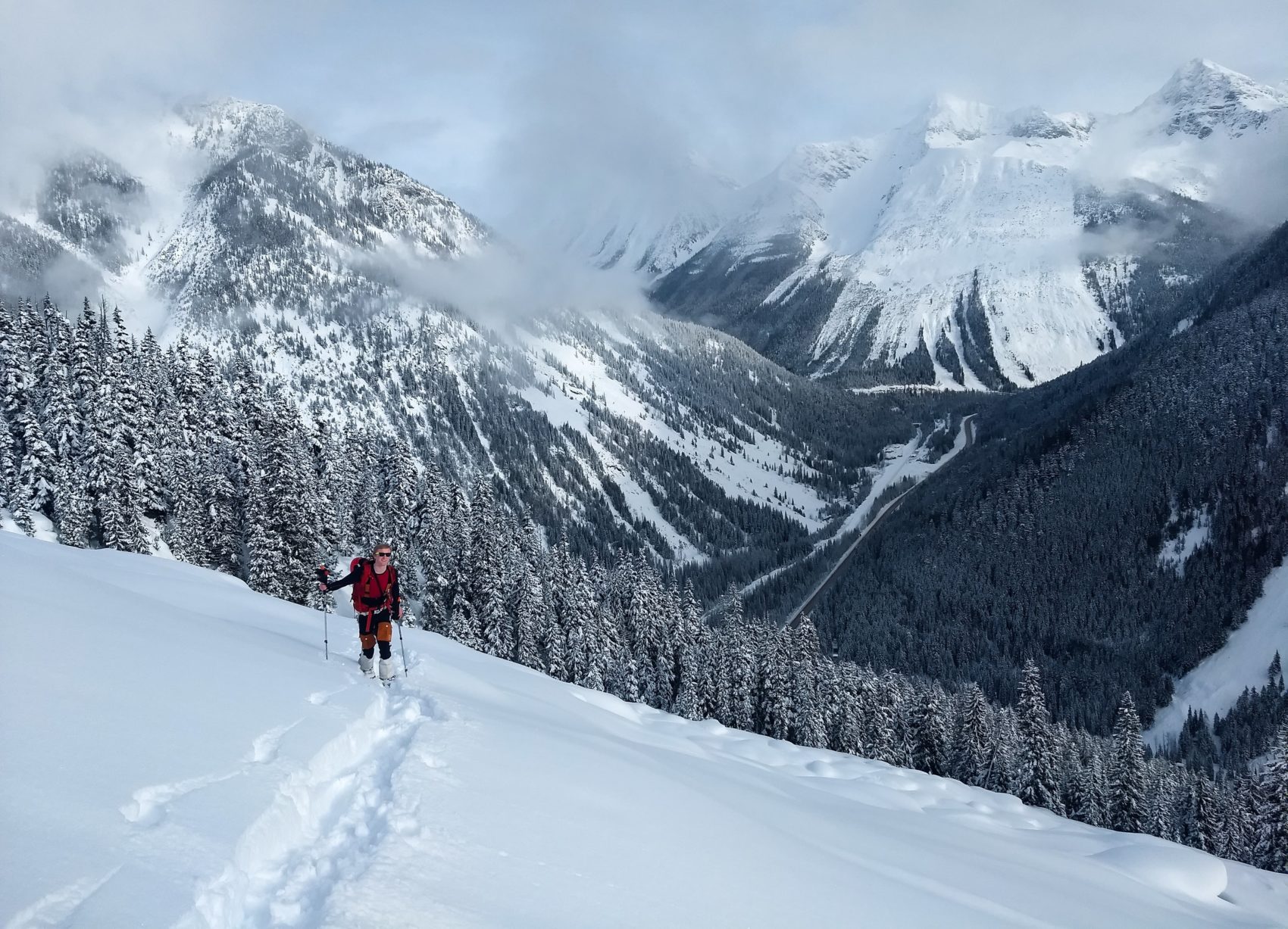 splitboarder touring up rogers pass