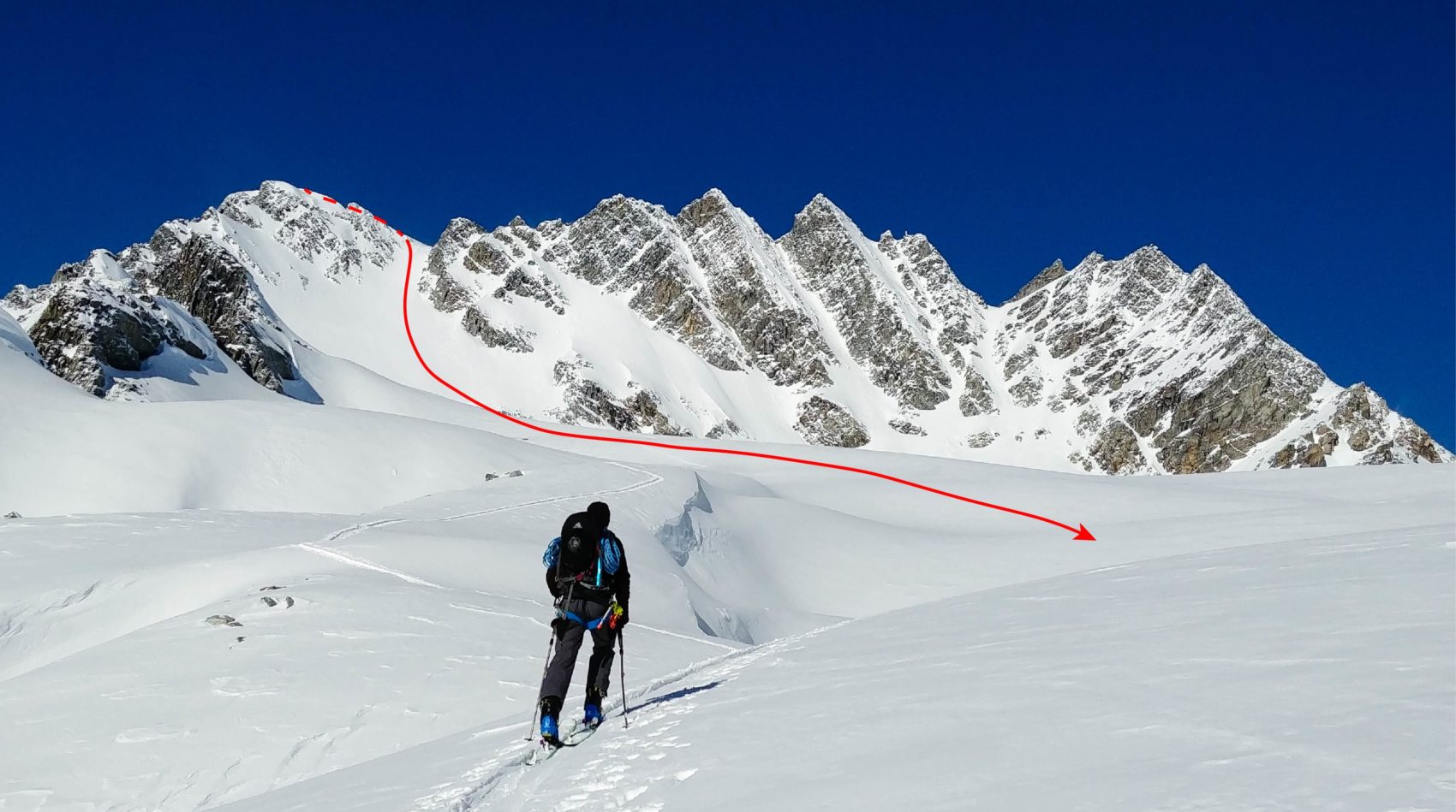 skier climbing rogers peak