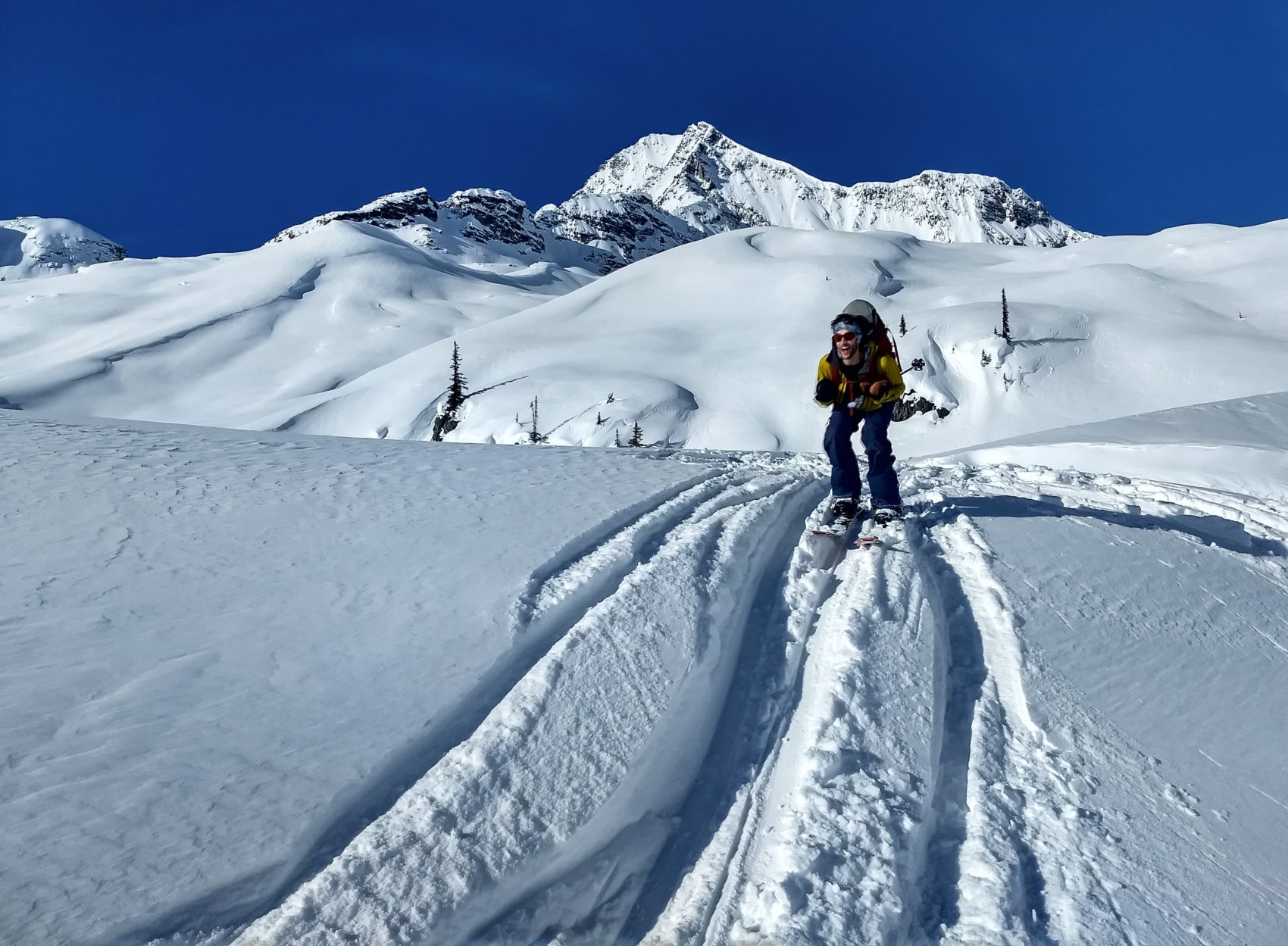 splitboarder giving skiing a go