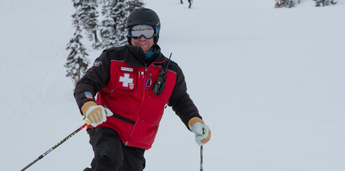 A ski happy ski patroller.