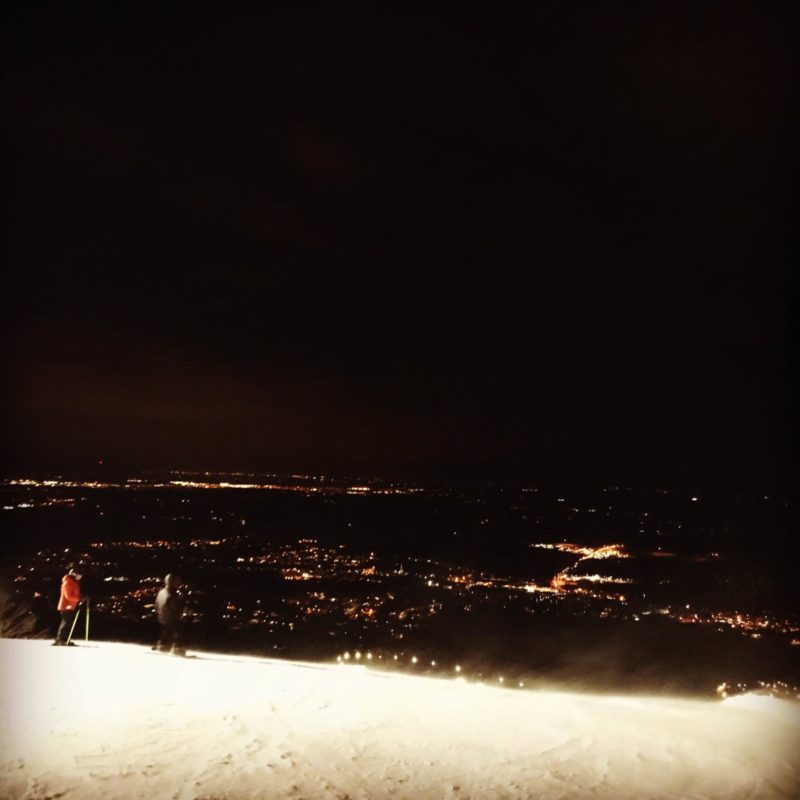 Riding above the city lights