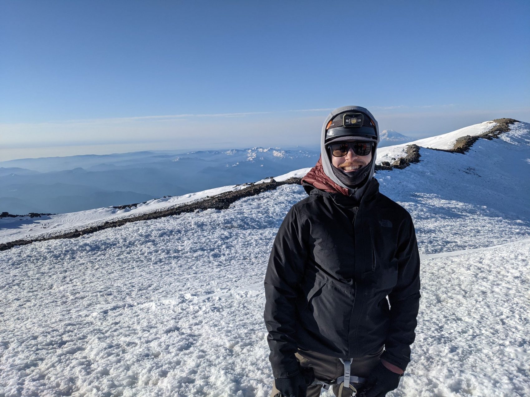 Boy on mountain top, rainier, Washington