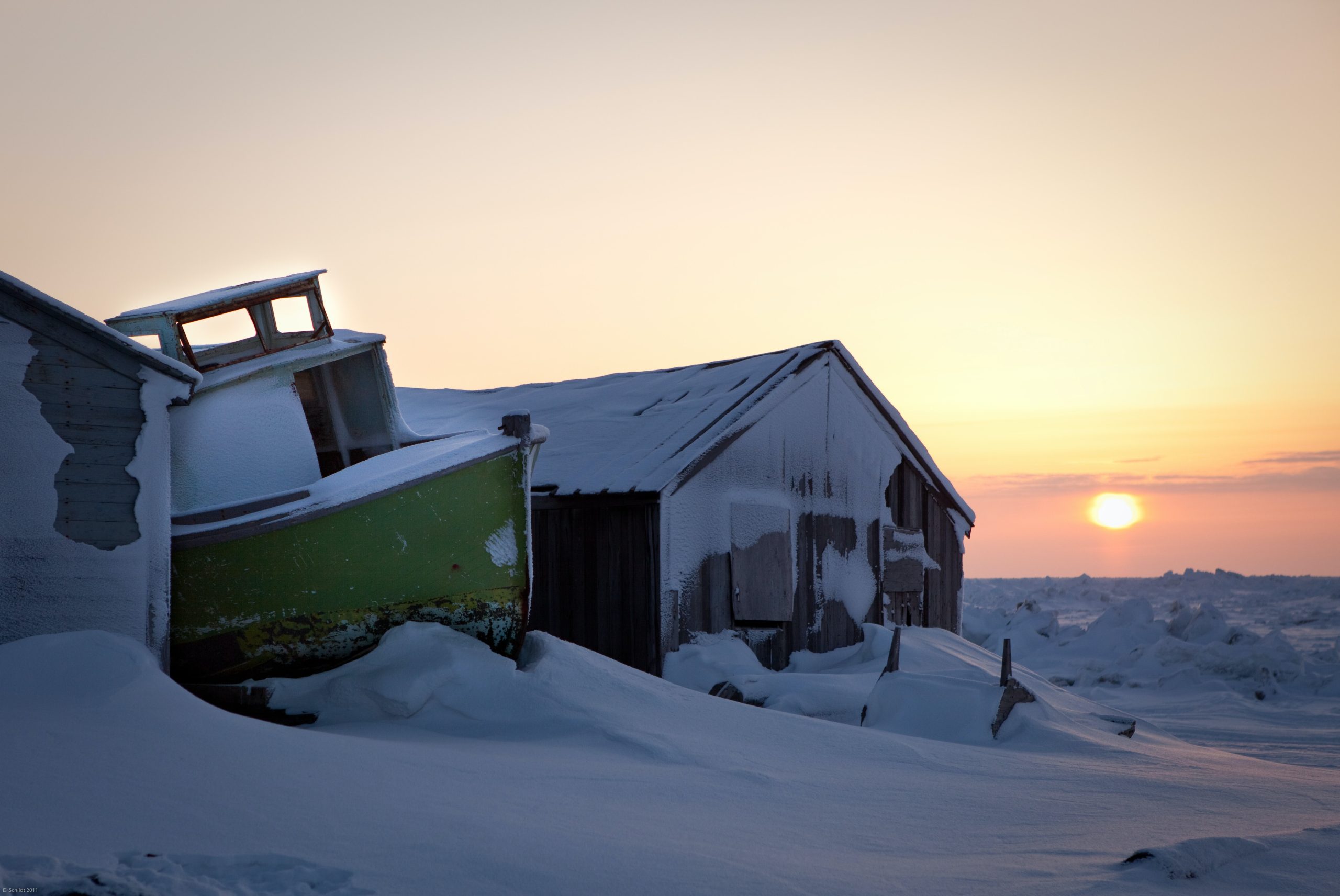 sun snow and boats in Barrow, AK