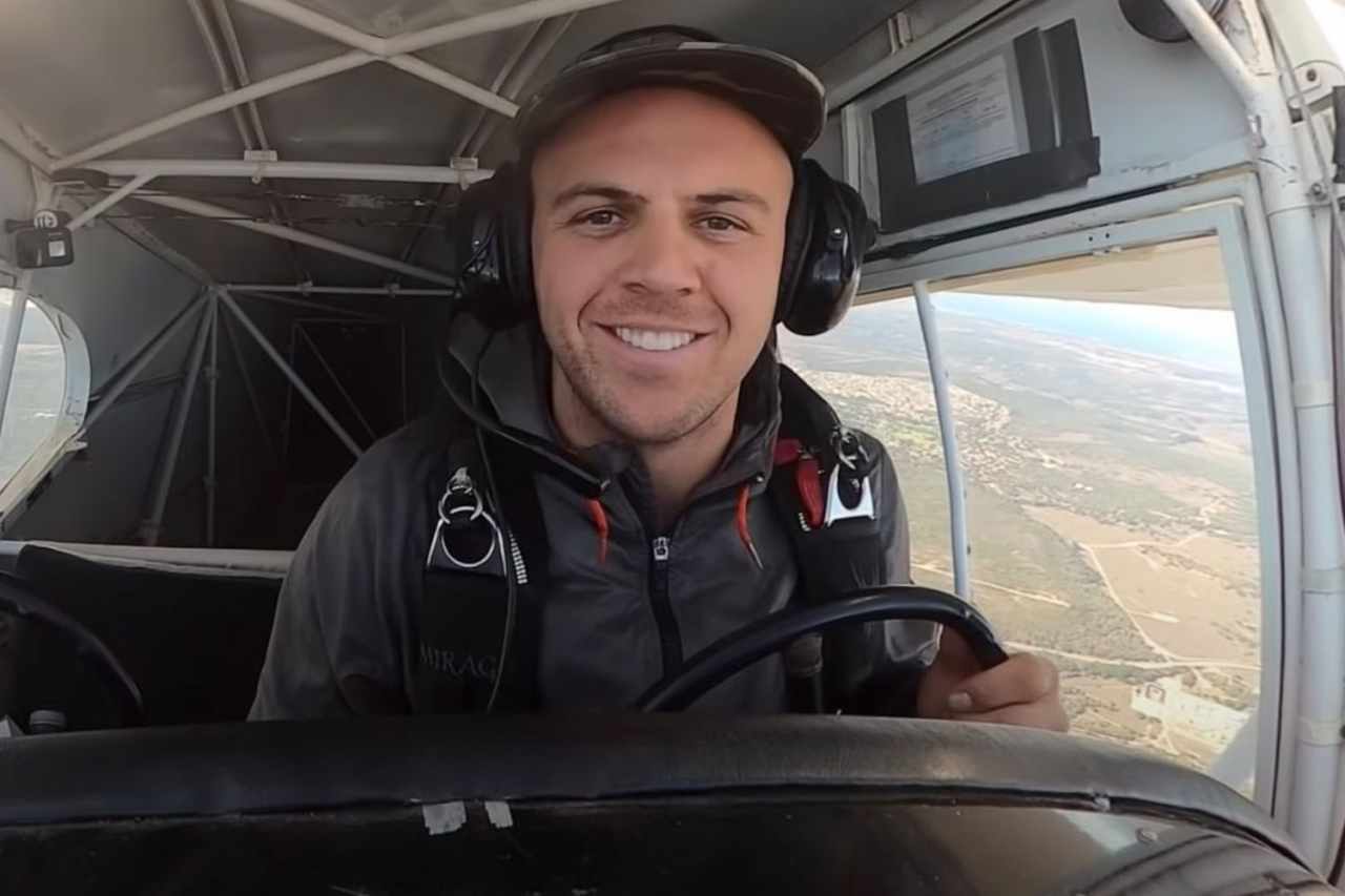 Snowboarder Trevor Jacob in cockpit before parachuting 