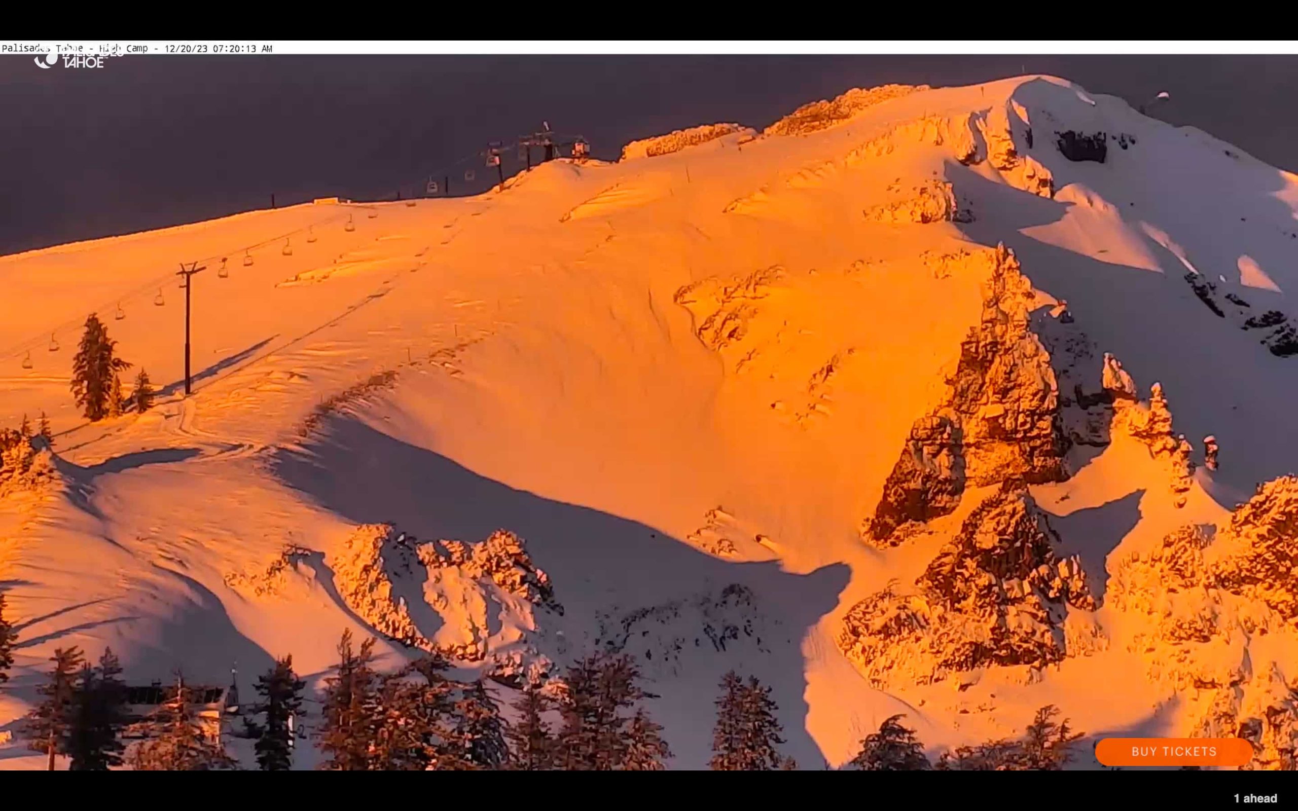 Palisades Tahoe sunrise over snowy mountain