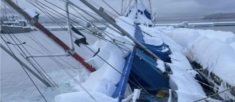 Heavy snowfall causes boat to sink