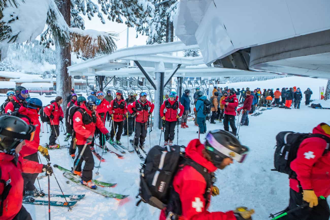 ski patrollers at a lift at Palisades Tahoe california