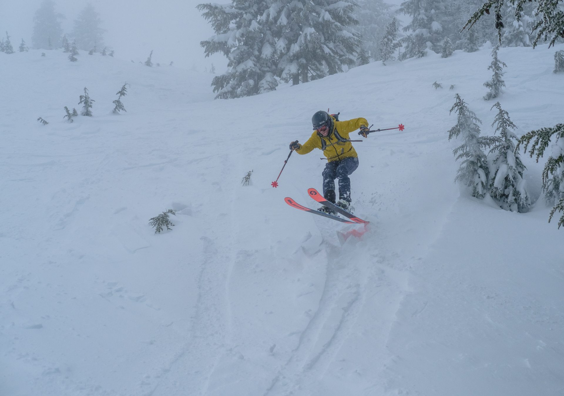 skier launching a wind lip, stoke is high